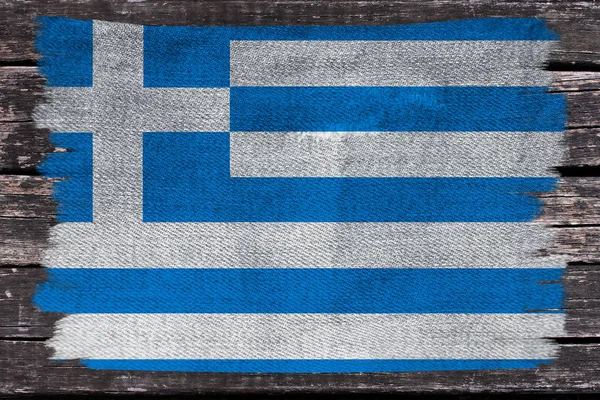 Beautiful photo of the colored national flag of the modern state of Greece on textured fabric, concept of tourism, emigration, economics and politics, close up — Stock Photo, Image