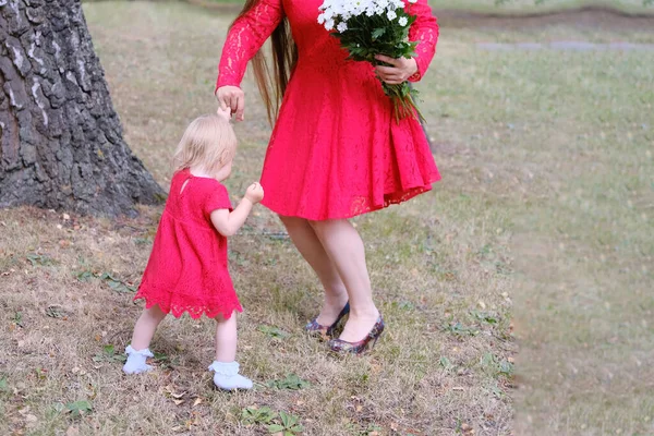 Little Baby Beautiful Girl Mom Daughter Red Dresses Walking Together — Stock Photo, Image