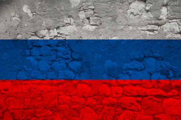 ロシア国家の国旗は 世界貿易の概念を持つ古い石の壁に — ストック写真