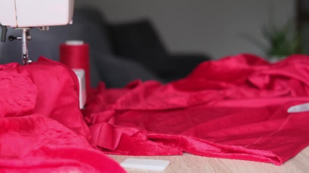 Seamstress Dressmaker Cuts Clothes Red Velvet Cloth Selective Focus Needle — Stock Video