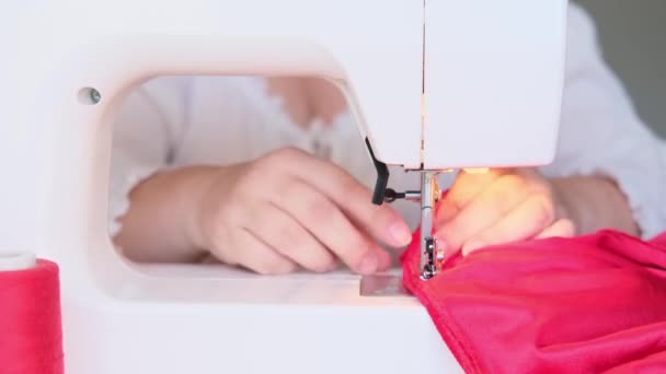 Red Velvet Cloth Threads Lie Modern Sewing Machine Selective Focus — Stock Video