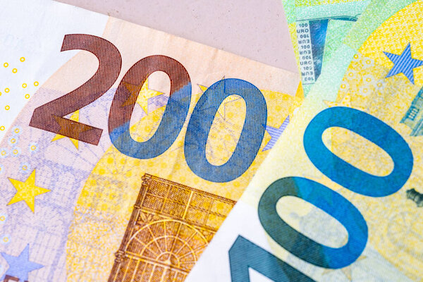 Euro banknotes close-up with 200 euro paper money, European Union currency background, investment and savings concept, denomination capital and finance, finance industry, currency exchange