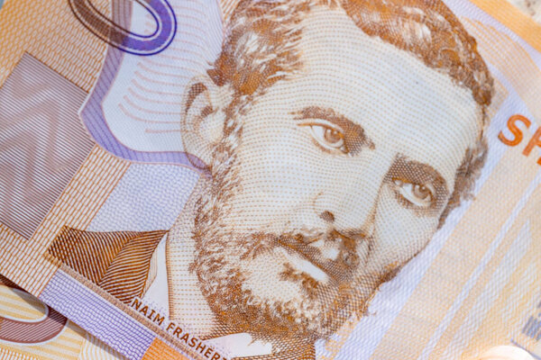 German driver's license in brown leather wallet with EU flag, Modern European driving permit, transport rights, EU citizen travel, mobility document, close-up macro shot, Frankfurt - July 9, 2025 