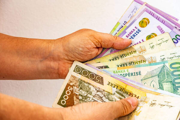 German driver's license in brown leather wallet with EU flag, Modern European driving permit, transport rights, EU citizen travel, mobility document, close-up macro shot, Frankfurt - July 9, 2025 
