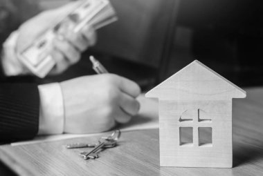 Emlak kavramı. Satılık veya Kiralık Konut Daire Kiralık. emlakçı. bir daire sözleşme imzalama. ipotek kavramı. tek renkli