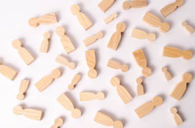 Ahşap figürler insanların beyaz bir arka plan üzerinde yalan söylüyorsun. Sosyal ağ. İş. İnsan kaynakları yönetimi kavramı. Kelle avcıları. İnsanların çalışma arayın. İkinci yarı için arama.