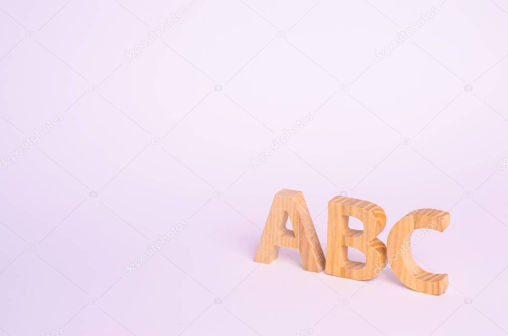 Red apple and letters ABC on a white background. The concept of primary education. school, college, university, educational institution. Alphabet