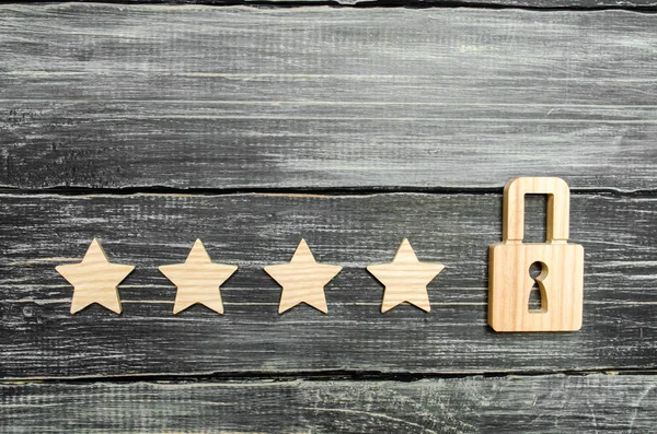 Four stars and a padlock. The concept of assigning the fifth star, a limitation in the ranking. The desire to get the fifth star. Improving the quality of service and ranking. Unlock a new level.