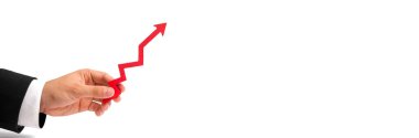 Bir işadamı el Beyaz bir arka plan üzerinde kırmızı bir ok tutar. Yetiştirme ve gelir ve karlar, yükselen fiyatlar ve maaşlarını çarparak kavramı. Yüksek talep, pozitif ekonomi. afiş