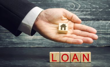 Minyatür ahşap ev ve yazıt 