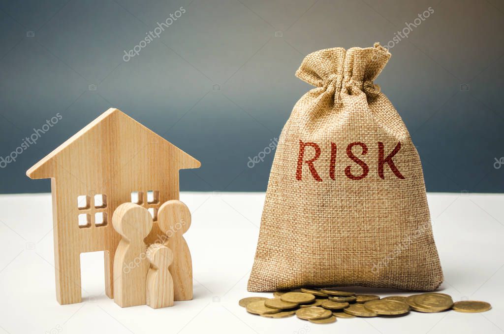 A money bag with the word risk and a family standing near the house. The concept of risk, loss of real estate. Property insurance. Loans secured by home, apartment. Financial risks, litigation.