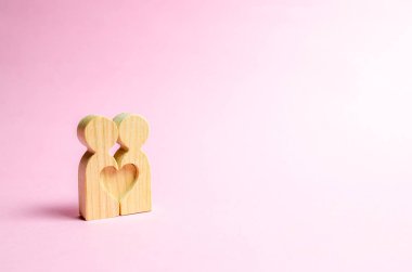 Rakamlar insanların yan yana ve kalp şeklini. Aşk ve ilişkiler kavramı. Arama için bir ruh ve flört. Flört, swingers. Sevgililer Günü'nde ikinci yarısında.