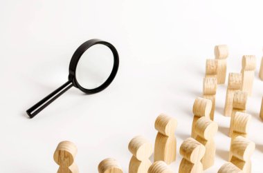 A crowd of people looking into a magnifying glass. Search and tracing concept, find out the truth. Find a solution to the problem. Expedition, research, review and exloration. Search for work, leisure