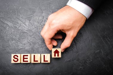 Emlak el resmi evi olan bir küp kelime Satılık koyar. Kavramı bir ev, daire, emlak satışı. Hareketsizlik Pazar. Ticaret özellik. Uygun fiyatlı konut.