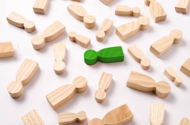 Ahşap figürler insanların beyaz bir arka plan üzerinde yalan söylüyorsun. İnsan kaynakları yönetimi kavramı. Kelle avcıları. İnsanların çalışma arayın. İkinci yarı için arama. Sosyal ağ. İş