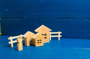 Üç ev mavi bir arka plan üzerinde. Alış ve satış Emlak, inşaat. Minimalizm. sunumlar için. Emlak piyasası. Daire ve daire. Şehir, yerleşim.