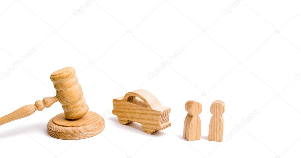 Wooden figurine of a car with people in a hammer of the judge on a white background. Minimalism. Purchase and sale of the car. The trial, confiscation of the machine. Recognition of ownership.