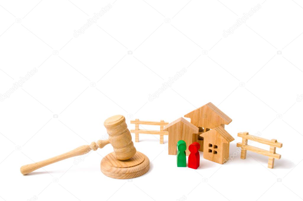 The concept of laws and regulations for tenants and owners of a residential building. Condominiums. Wooden apartment house with people, keys and a judge hammer on a white background.