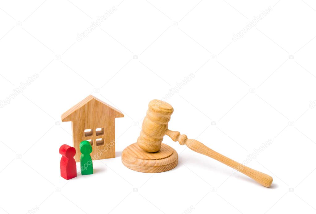 The concept of laws and regulations for tenants and owners of a residential building. Wooden apartment house with people, keys and a judge hammer on a white background. Condominiums.