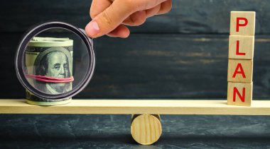 Dolar ve kelime planı üzerinde ölçekler vardır. Mali ve bütçe planlama. Finansal yatırımlar ve hedef bir plan eyleme koyarak. Kaydetme ve rüyalarını yapmak için para tasarrufu. yatırım
