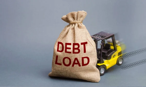 Forklift unable to pick up a bag with the inscription Debt Load. Debt burden, financial difficulties in repayment. Credit restructuring. Financial stability. Low credit rating. Microloans, bankruptcy.