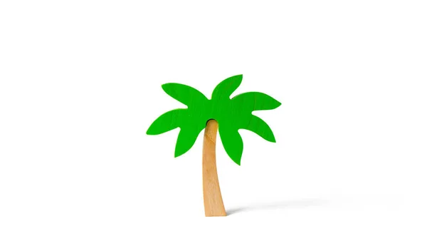 Wooden palm tree on an isolated background. Tours and cruises to warm countries. The development of tourism. Tropical island. Conceptual leisure and vacation, entertainment and relaxation. — Stock Photo, Image