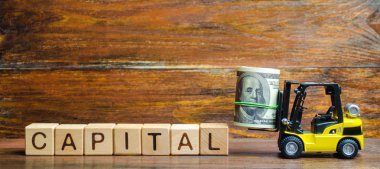 Sarı forklift kamyon yazıt Sermaye dolar bir demet taşır. İş koşullarının çekiciliğinin artırılması, ekonomiye yatırım akışının artırılması. ekonomik büyüme