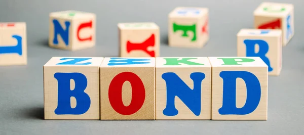 Wooden blocks with the word Bonds. A bond is a security that indicates that the investor has provided a loan to the issuer. Equivalent loan. Unsecured and secured bonds