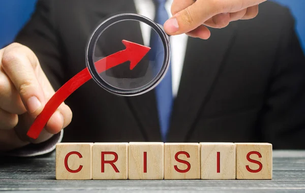 Businessman Holds Arrow Blocks Word Crisis Increase Instability Business Economy — Stock Photo, Image