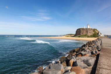 Nobbys Lighthouse is one of Newcastle's most famous landmarks. The lighthouse dates from the 19th century and was the third lighthouse constructed in NSW. Newcastle is Australia's second oldest city just north Sydney clipart