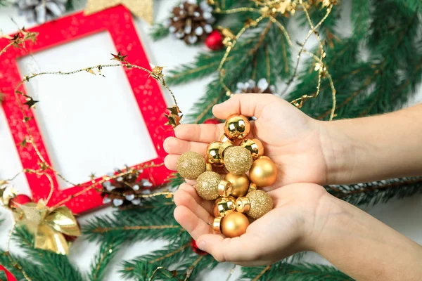 New Year Gold Spheres Small Size Open Children Palms Background — Stock Photo, Image