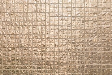 Altın gölgenin küçük kare karolarından arka plan 