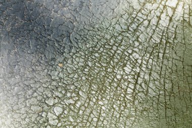 Çatlak boyalı eski duvarın dokusu. kuru yüzey