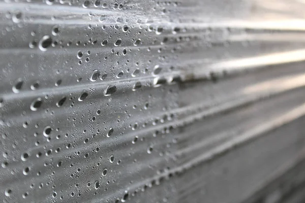 texture of a stretched film with water droplets background