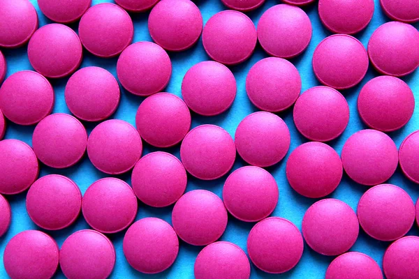 Textuur Van Een Heleboel Ronde Roze Pillen Verspreid Tabel — Stockfoto