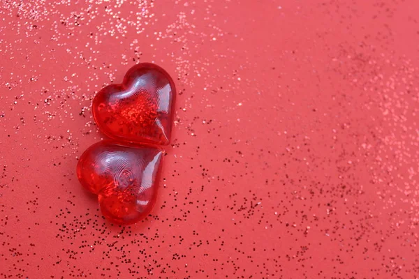Two Red Plastic Hearts Red Background — Stock Photo, Image
