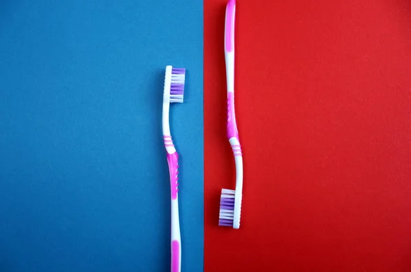 Two Toothpastes Red Blue Background — Stock Photo, Image