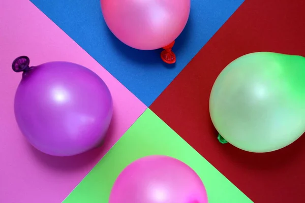 Balloons of different colors on a different background