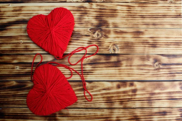 Two Hearts Red Color Tied Thread Lie Wooden Background — Stock Photo, Image
