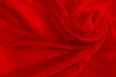 kırmızı ipek narin kumaş örülmüş ve örtülmüş