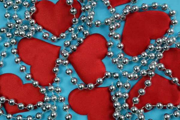Texture Red Hearts Beads Blue Background — Stock Photo, Image