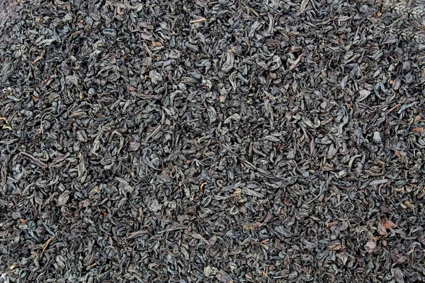 Textura Sypkého Černého Suchého Čaje Rozloženého Rovném Povrchu — Stock fotografie