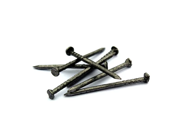 Pile Iron Nails Lie White Background — Stock Photo, Image