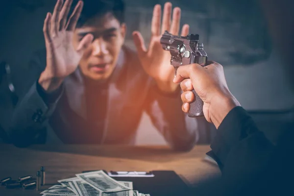 Criminals Aiming Young Businessman Dollar Banknotes Usd Bullets Table Young — Stock Photo, Image