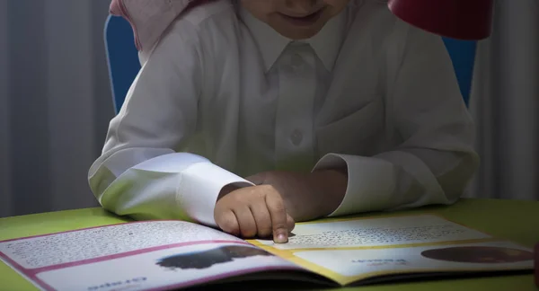 Saudi Boy Reading Story Table Lamp Close — Stock Photo, Image