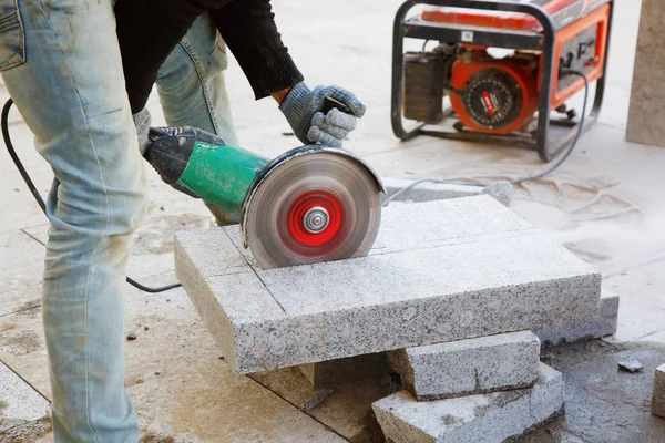 Worker with angle grinder — Stock Photo, Image