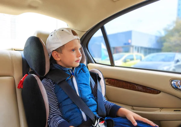 Boy in car safety seat. Safety concept