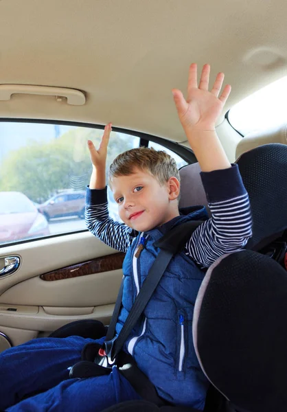 Boy in car safety seat. Safety concept — Stock Photo, Image