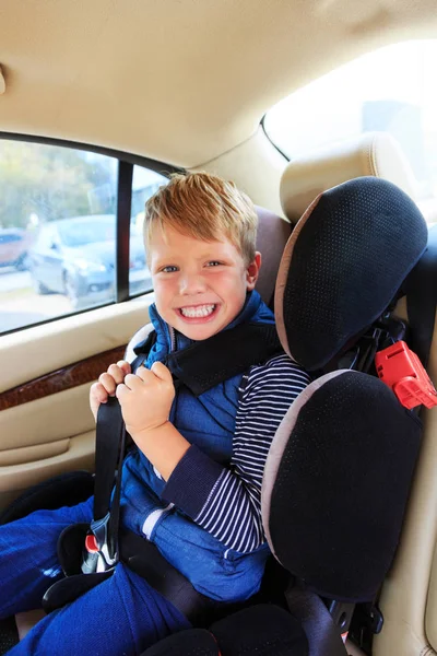 Boy in car safety seat. Safety concept