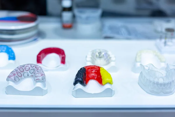 Dental orthodontic tools. Multi-colored device for making a molded tooth. Molding teeth.